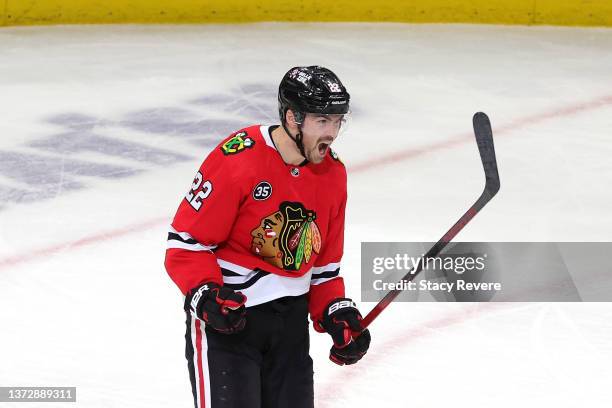 Ryan Carpenter of the Chicago Blackhawks celebrates a goal during the third period against the New Jersey Devils at United Center on February 25,...