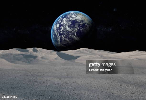 moon surface with distant earth and starfield - lunar stock-fotos und bilder