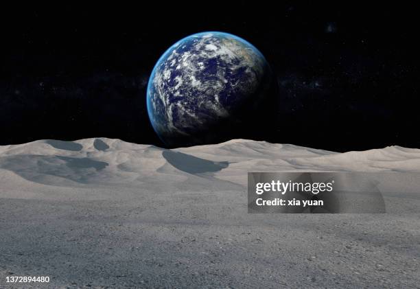 moon surface with distant earth and starfield - waxing stock pictures, royalty-free photos & images