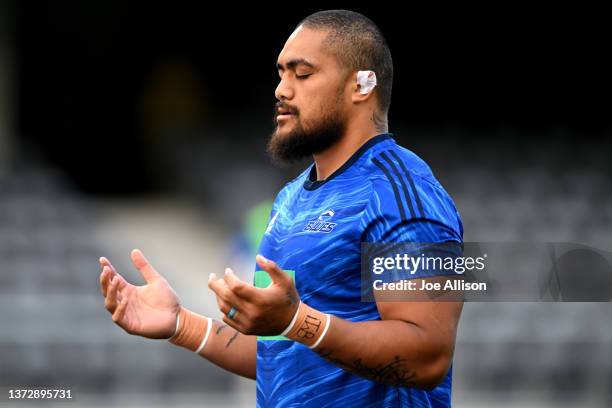Ofa Tuungafasi of the Blues prays ahead of the round two Super Rugby Pacific match between the Blues and the Hurricanes at Forsyth Barr Stadium on...