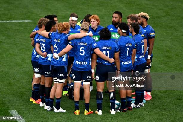 The Blues huddle ahead of the round two Super Rugby Pacific match between the Blues and the Hurricanes at Forsyth Barr Stadium on February 26, 2022...