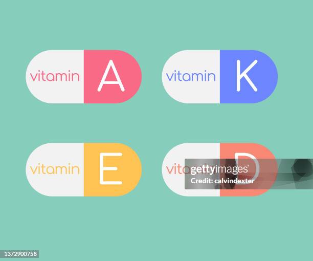 vitamin pills - vitamin e stock illustrations