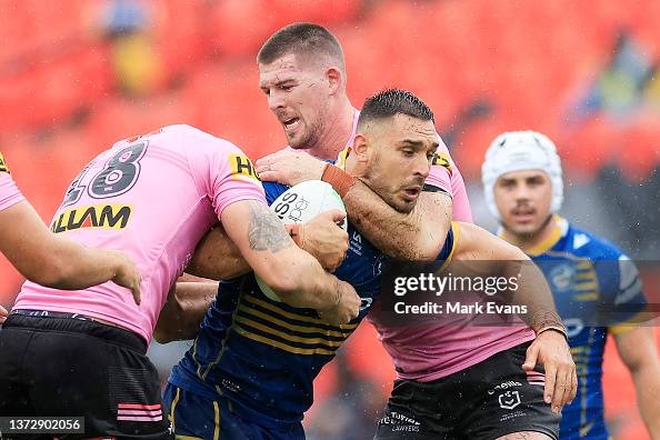 Ryan Matterson Rugby Ryan Matterson of the Eels is tackled during the NRL Trial Match ...