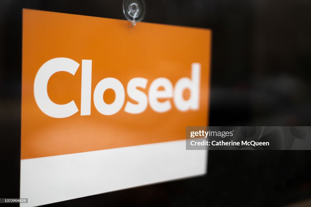 Closed Window Signage Closed Sign Hanging On Front Window Of Retail Establishment High-Res ...