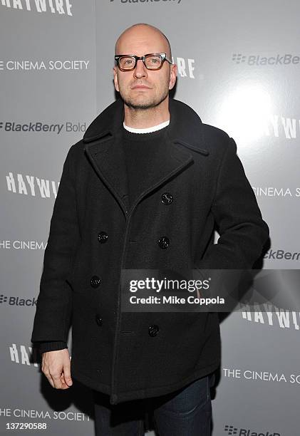 Producer Gina Carano attends the Cinema Society & Blackberry Bold screening of "Haywire" at Landmark Sunshine Cinema on January 18, 2012 in New York...