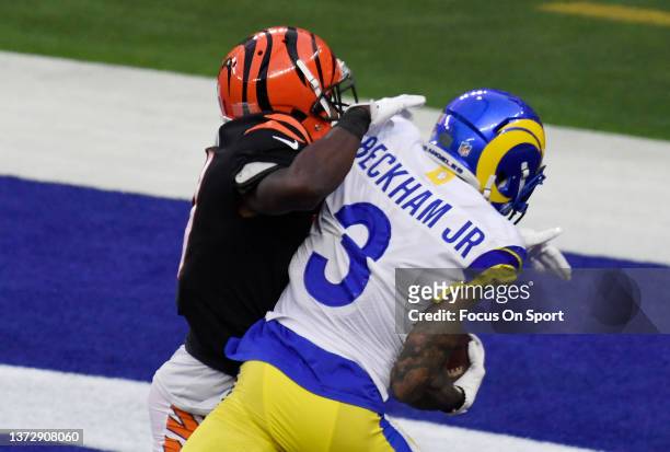 Odell Beckham Jr. #3 of the Los Angeles Rams catches a touchdown pass over Mike Hilton of the Cincinnati Bengals in the first half during Super Bowl...