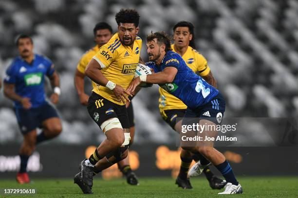 Ardie Savea of the Hurricanes charges forward during the round two Super Rugby Pacific match between the Blues and the Hurricanes at Forsyth Barr...