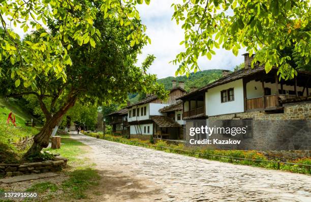 tourists in the architectural ethnographic complex etar near town of gabrovo. - bulgarians stock pictures, royalty-free photos & images