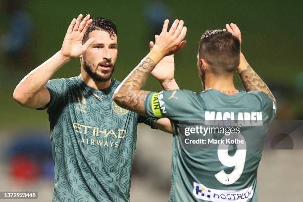 Mathew Leckie and Jamie Maclaren of Melbourne City FC celebrate Lekie scoring a goal during the A-League Men's match between Sydney FC and Melbourne...