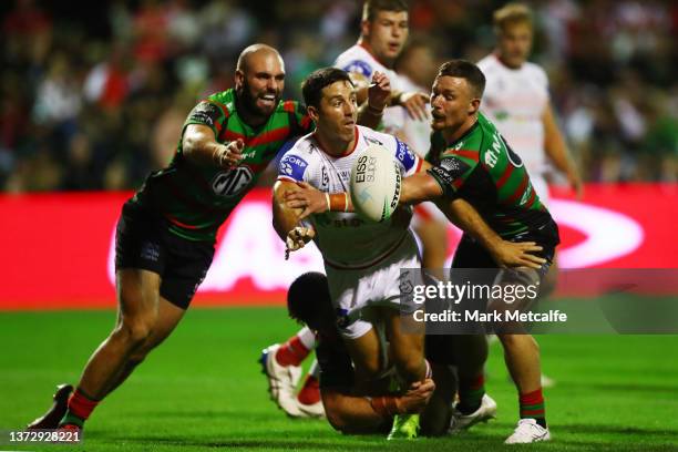 Ben Hunt of the Dragons offloads during the Charity Shield NRL Trial Match between the South Sydney Rabbitohs and St George Illawarra Dragons at Glen...