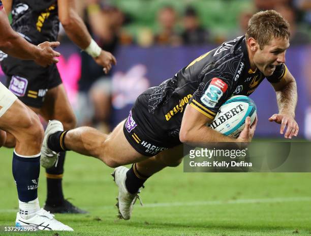 Kyle Godwin of the Force scores a try during the round two Super Rugby Pacific match between the Melbourne Rebels and the Western Force at AAMI Park...