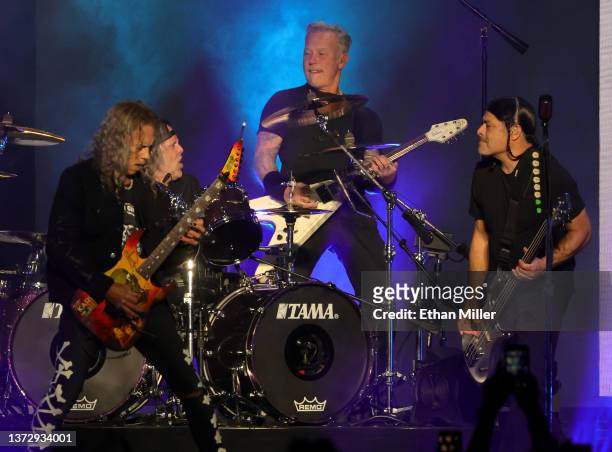 Guitarist Kirk Hammett, drummer Lars Ulrich, frontman James Hetfield and bassist Robert Trujillo of Metallica perform at Allegiant Stadium on...