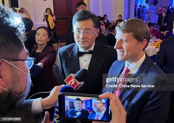 China Ambassador's to the US Qin Gang and Christopher Nixon Cox , grandson of President Richard Nixon, speak to the media at a banquet marking the...