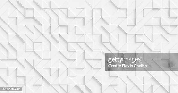 white wall with subtle white triangle pattern - wall background ストックフォトと画像