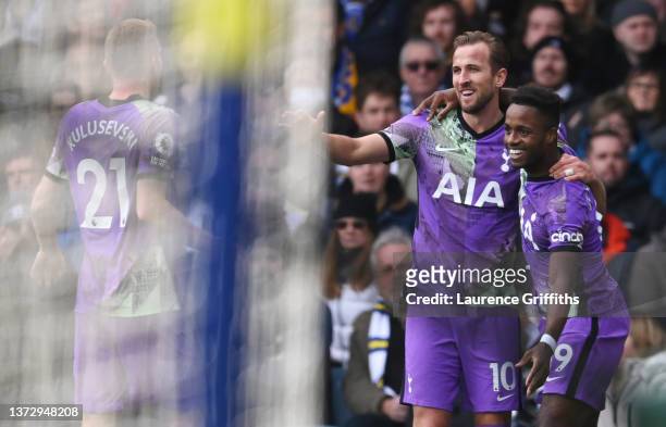 Harry Kane of Tottenham Hotspur celebrates after scoring their side's first goal with Ryan Sessegnon during the Premier League match between Leeds...