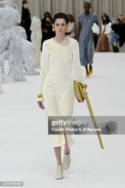 Model walks the runway at the Jil Sander fashion show during the Milan Fashion Week Fall/Winter 2022/2023 on February 26, 2022 in Milan, Italy.