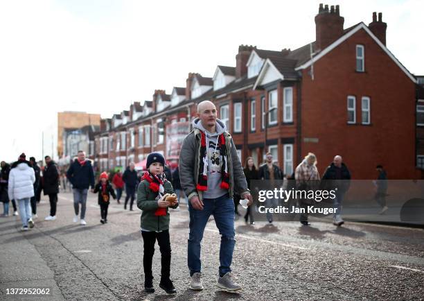 Manchester United fans gather outside Old Trafford before the Premier League match between Manchester United and Watford at Old Trafford on February...