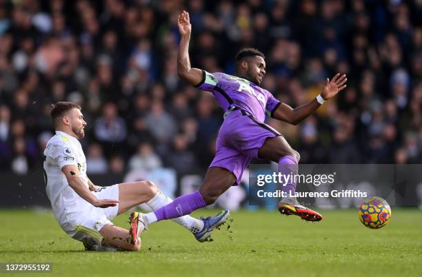 Ryan Sessegnon of Tottenham Hotspur is challenged by Stuart Dallas of Leeds United during the Premier League match between Leeds United and Tottenham...