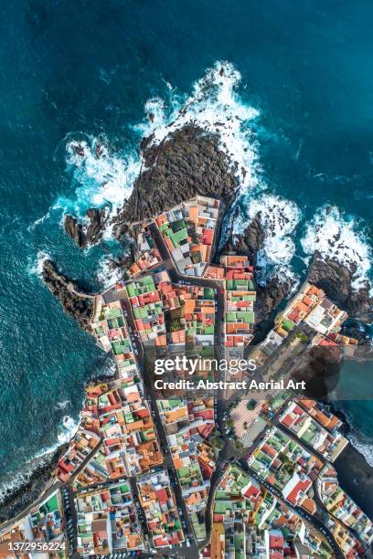 townscape on the edge of a cliff seen from directly above, punta brava, tenerife, spain - protruding stock pictures, royalty-free photos & images