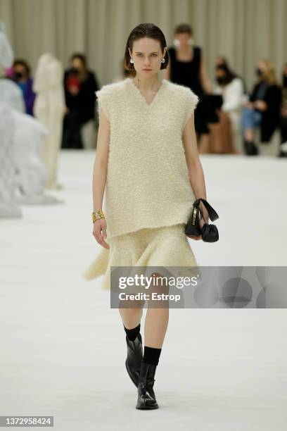 Model walks the runway at the Jil Sander fashion show during the Milan Fashion Week Fall/Winter 2022/2023 on February 26, 2022 in Milan, Italy.