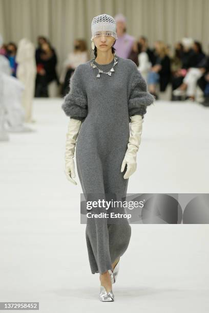 Model walks the runway at the Jil Sander fashion show during the Milan Fashion Week Fall/Winter 2022/2023 on February 26, 2022 in Milan, Italy.