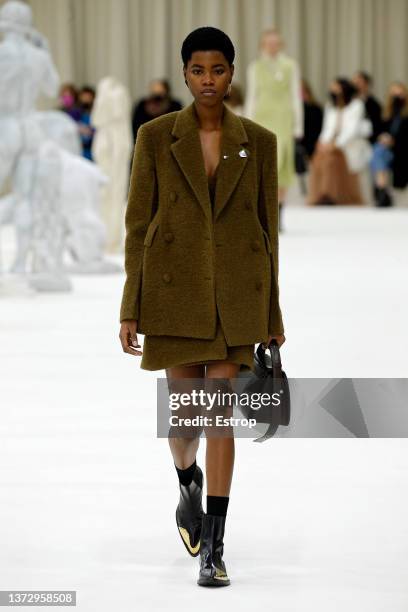 Model walks the runway at the Jil Sander fashion show during the Milan Fashion Week Fall/Winter 2022/2023 on February 26, 2022 in Milan, Italy.