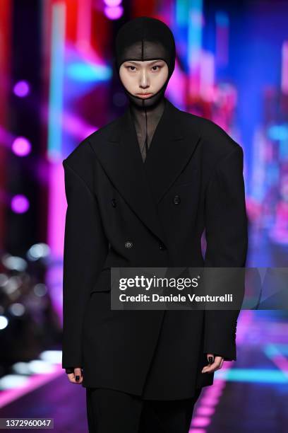 Model walks the runway at the Dolce & Gabbana fashion show during the Milan Fashion Week Fall/Winter 2022/2023 on February 26, 2022 in Milan, Italy.
