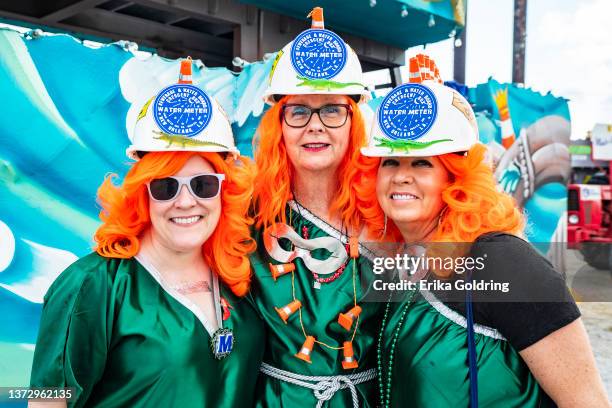 Members of the Krewe of Muses pose for a photo before their parade on February 24, 2022 in New Orleans, Louisiana. 2021 Mardi Gras parades and balls...