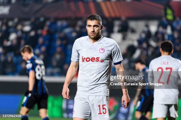 Sokratis Papastathopoulos of Olympiacos walks in the field during the UEFA Europa League Knockout Round Play-Offs Leg One match between Atalanta and...