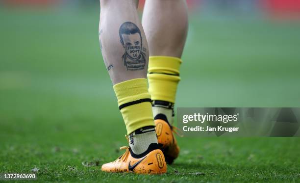 Detailed view of the tattoo of Juraj Kucka of Watford FC prior to the Premier League match between Manchester United and Watford at Old Trafford on...