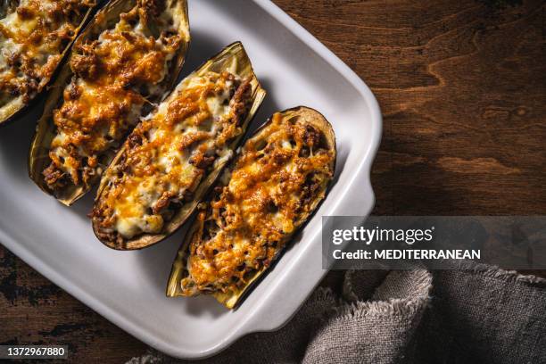 stuffed eggplants with minced meat recipe italian aubergine parmigiana or eggplant parmesan - eggplant imagens e fotografias de stock
