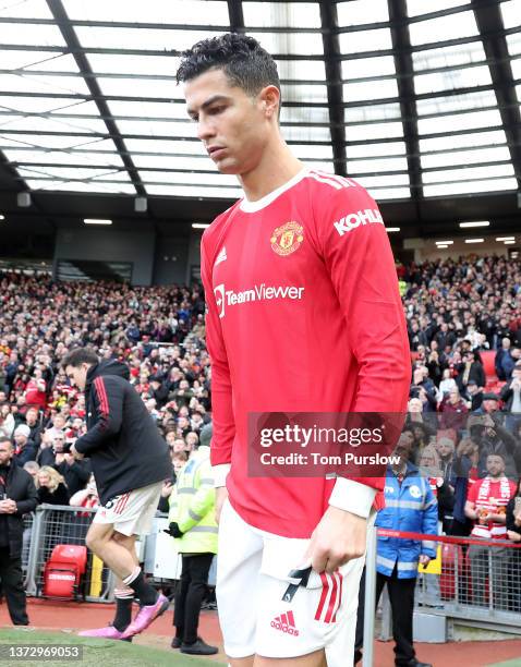 Cristiano Ronaldo of Manchester United walks out ahead of the Premier League match between Manchester United and Watford at Old Trafford on February...