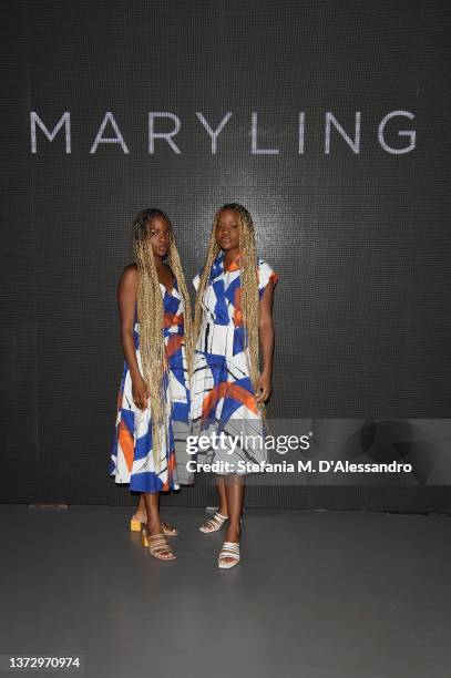 Paola Ameyibor and Pamela Ameyibor arrive at the Maryling fashion show during Milan Fashion Week Fall/Winter 2022/2023 at ADI Museum on February 25,...