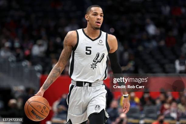 Dejounte Murray of the San Antonio Spurs dribbles against the Washington Wizards in the first quarter at Capital One Arena on February 25, 2022 in...