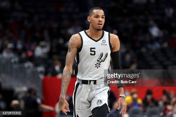 Dejounte Murray of the San Antonio Spurs looks on against the Washington Wizards in the first quarter at Capital One Arena on February 25, 2022 in...