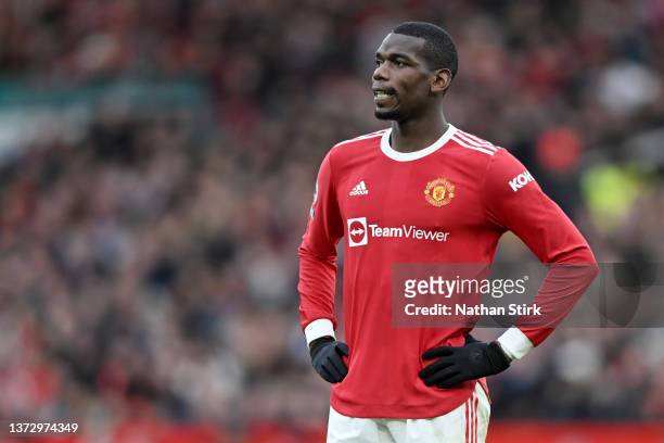 Paul Pogba of Manchester United reacts during the Premier League match between Manchester United and Watford at Old Trafford on February 26, 2022 in...