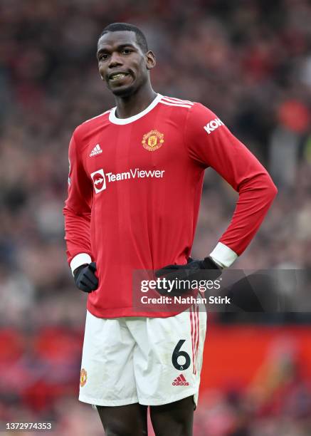 Paul Pogba of Manchester United reacts during the Premier League match between Manchester United and Watford at Old Trafford on February 26, 2022 in...