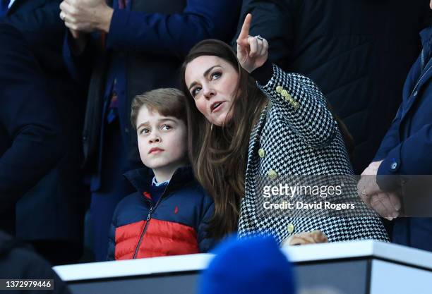 Catherine, Duchess of Cambridge speaks to their son Prince George of Cambridge prior to the Guinness Six Nations Rugby match between England and...