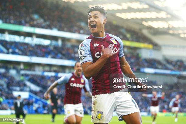 Ollie Watkins of Aston Villa celebrates after scoring their team's second goal during the Premier League match between Brighton & Hove Albion and...