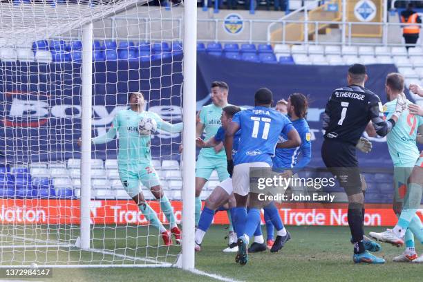 Levi Colwill of Huddersfield Town scores at the back post during the Sky Bet Championship match between Birmingham City and Huddersfield Town at St...