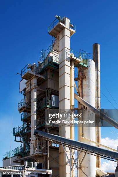 construction industry concrete plant and equipment - cement production factory on mining quarry - cement production stock pictures, royalty-free photos & images