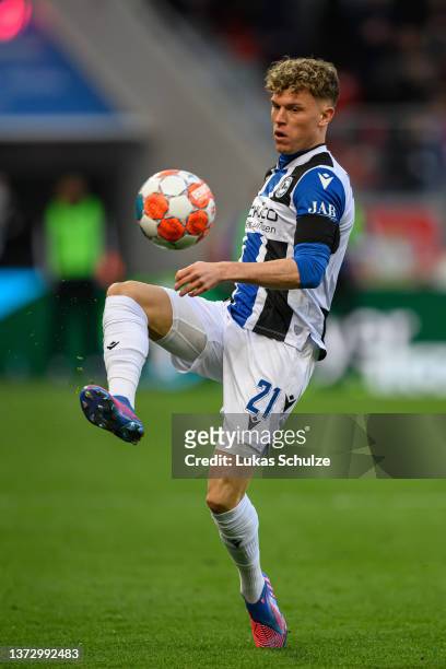 Robin Hack of Bielefeld kicks the ball during the Bundesliga match between Bayer 04 Leverkusen and DSC Arminia Bielefeld at BayArena on February 26,...