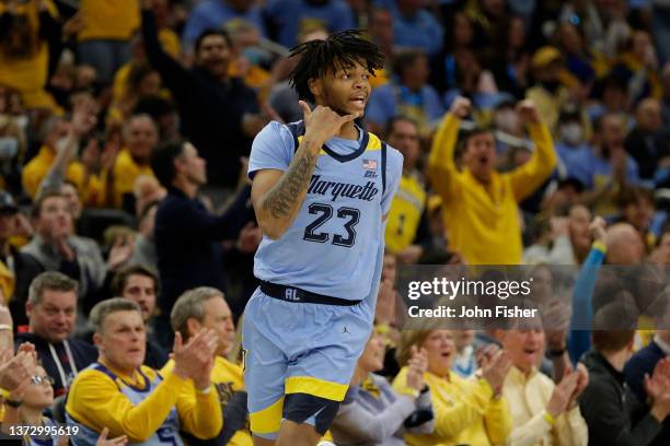 David Joplin of the Marquette Golden Eagles reacts after hitting a three point shot during the first half of the game against the Butler Bulldigs at...