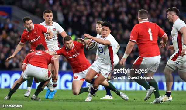 Marcus Smith of England breaks with the ball during the Guinness Six Nations Rugby match between England and Wales at Twickenham Stadium on February...