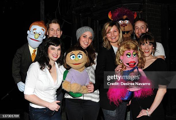 Recording Artist Sara Bareilles and Sugarland singer Jennifer Nettles pose with the "Avenue Q" cast at New World Stages on January 18, 2012 in New...