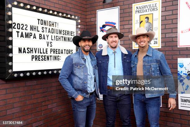 Pierre-Edouard Bellemare, Ryan McDonagh and Mathieu Joseph of the Tampa Bay Lightning arrive for the 2022 NHL Stadium Series game between the Tampa...