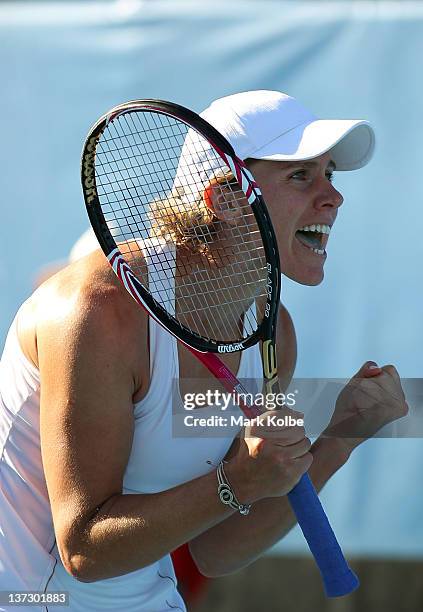 Greta Arn of Hungary celebrates winning her second round match against Dominika Cibulkova of Slovakia during day four of the 2012 Australian Open at...