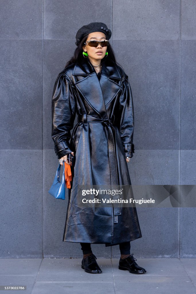 Baya Gorbunova poses ahead of the Jil Sander fashion show wearing a ...