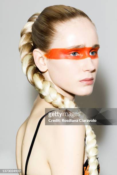 Model poses backstage of the Tokyo James fashion show during the Milan Fashion Week Fall/Winter 2022/2023 on February 26, 2022 in Milan, Italy.