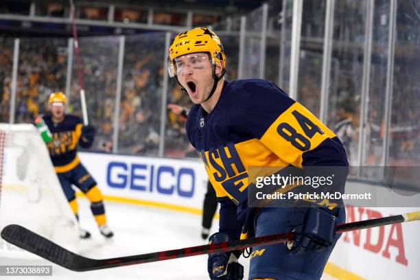 Tanner Jeannot of the Nashville Predators reacts after scoring a goal in the first period of the 2022 NHL Stadium Series game between the Tampa Bay...